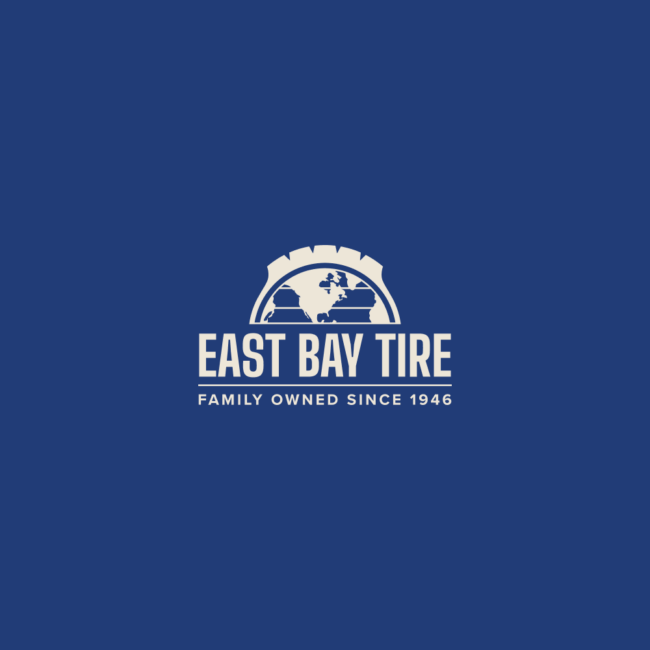East Bay Tire Logo on a blue background