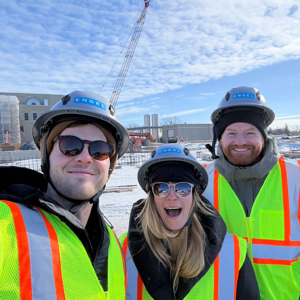 employees taking selfie on job site